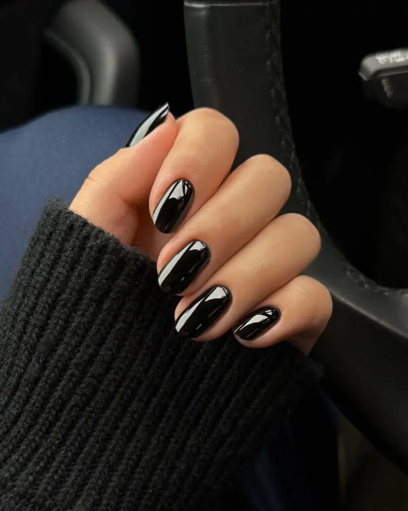 Glossy black nails with high shine finish new years manicure
