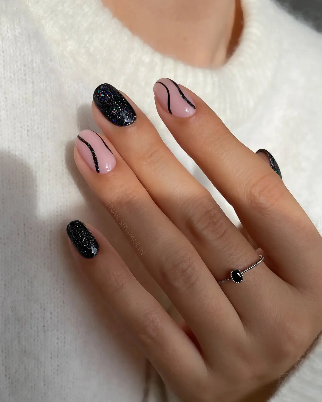 Sparkly black and nude nails
