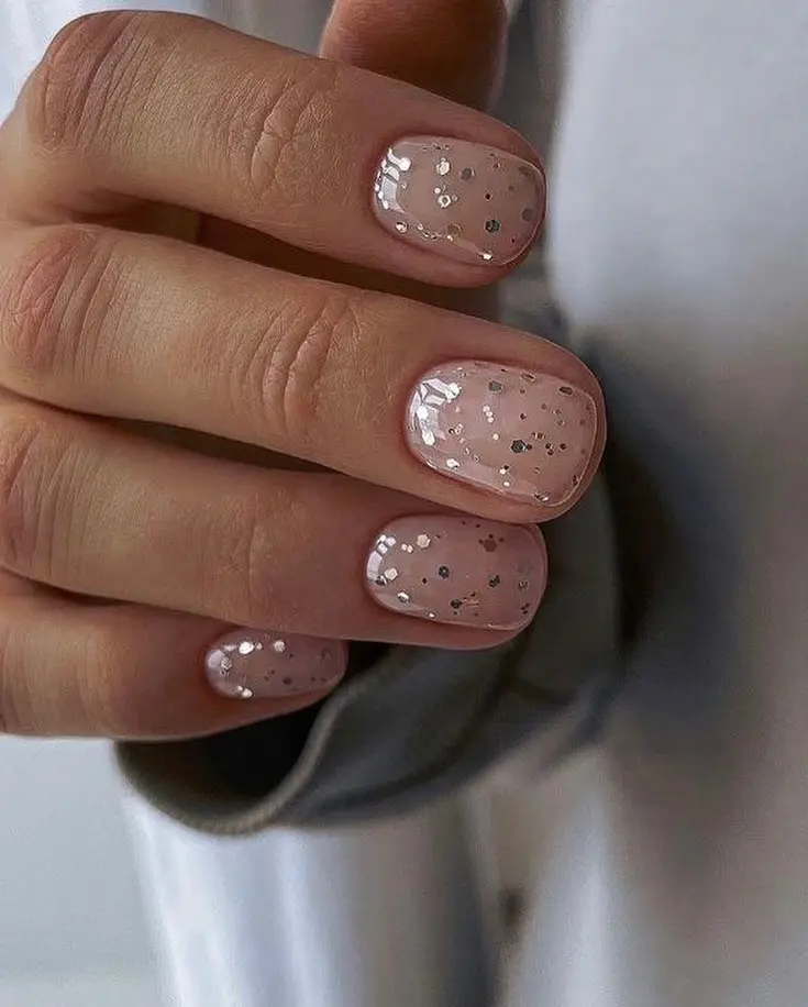 sheer nude silver sparkles nails