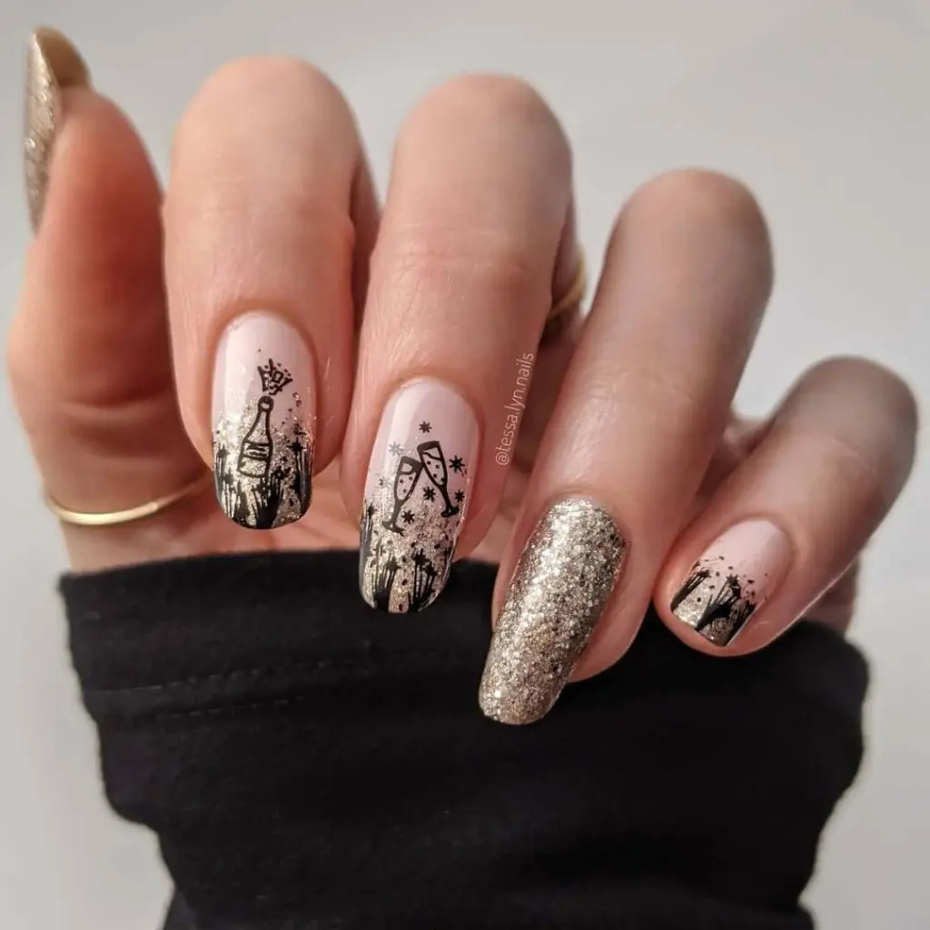 Champagne bottle and glass nail art on nude base with gold glitter accent nail for new years