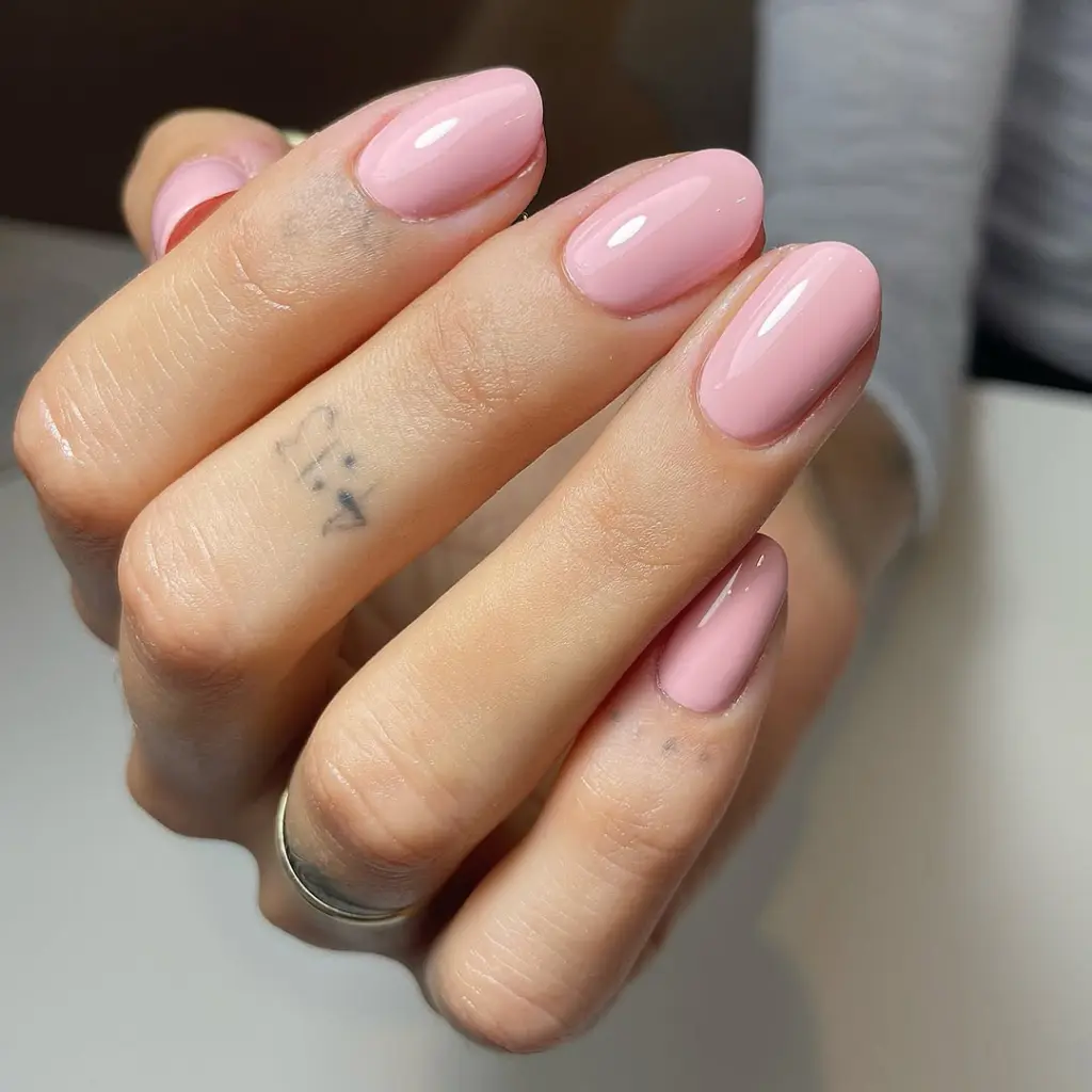 Medium oval nails in dusty rose pink gel polish
