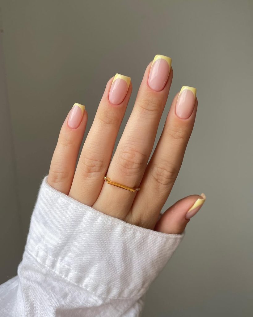 Elegant square nails with nude base and light yellow french tips