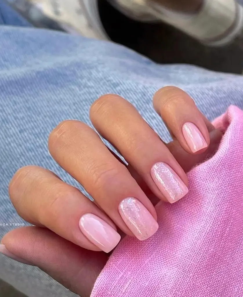 Short square nails with shimmer pink polish