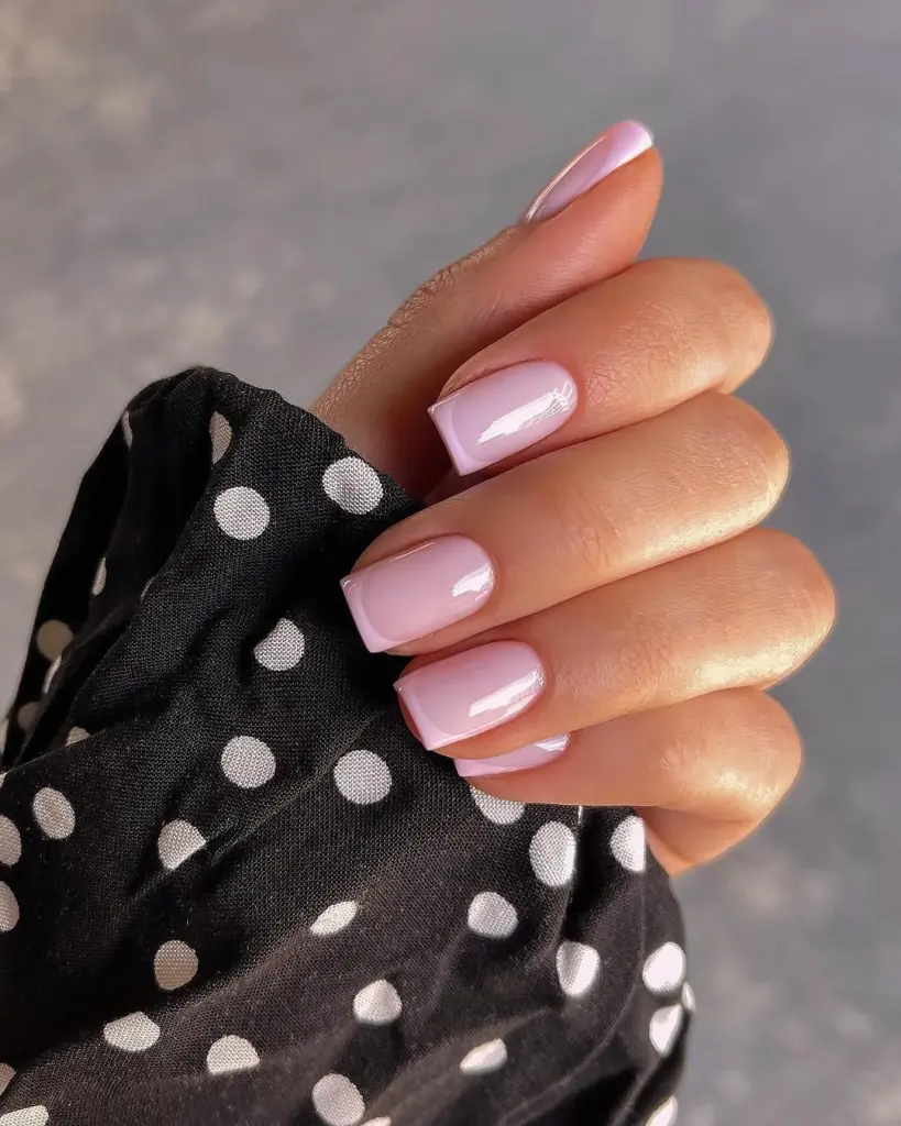  Medium square oval nails with sheer base and pink french tips
