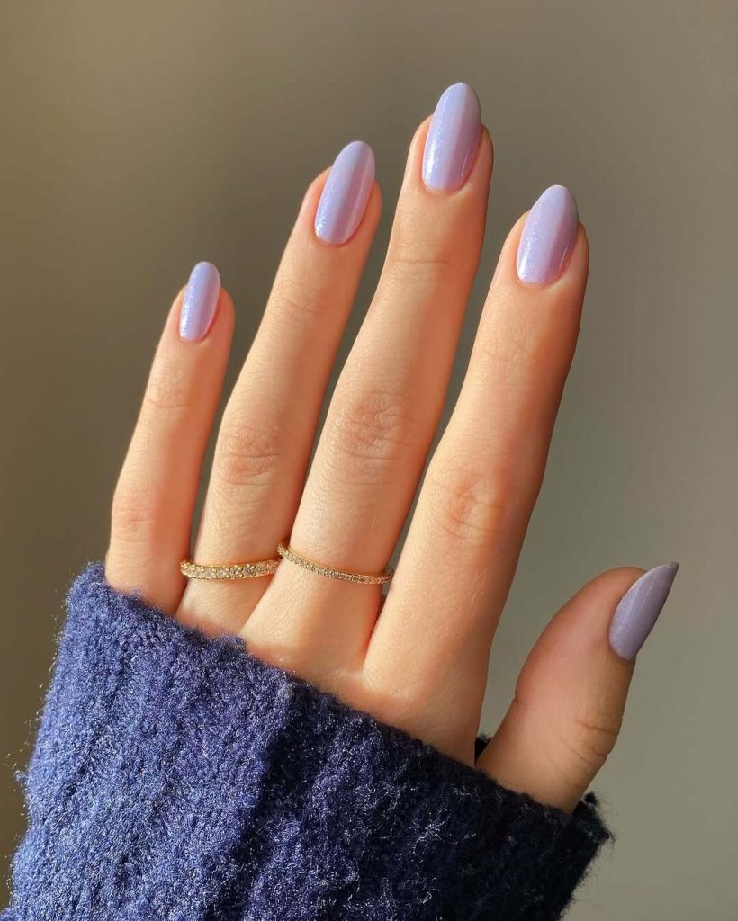  Shimmery periwinkle almond nails with pearl finish
