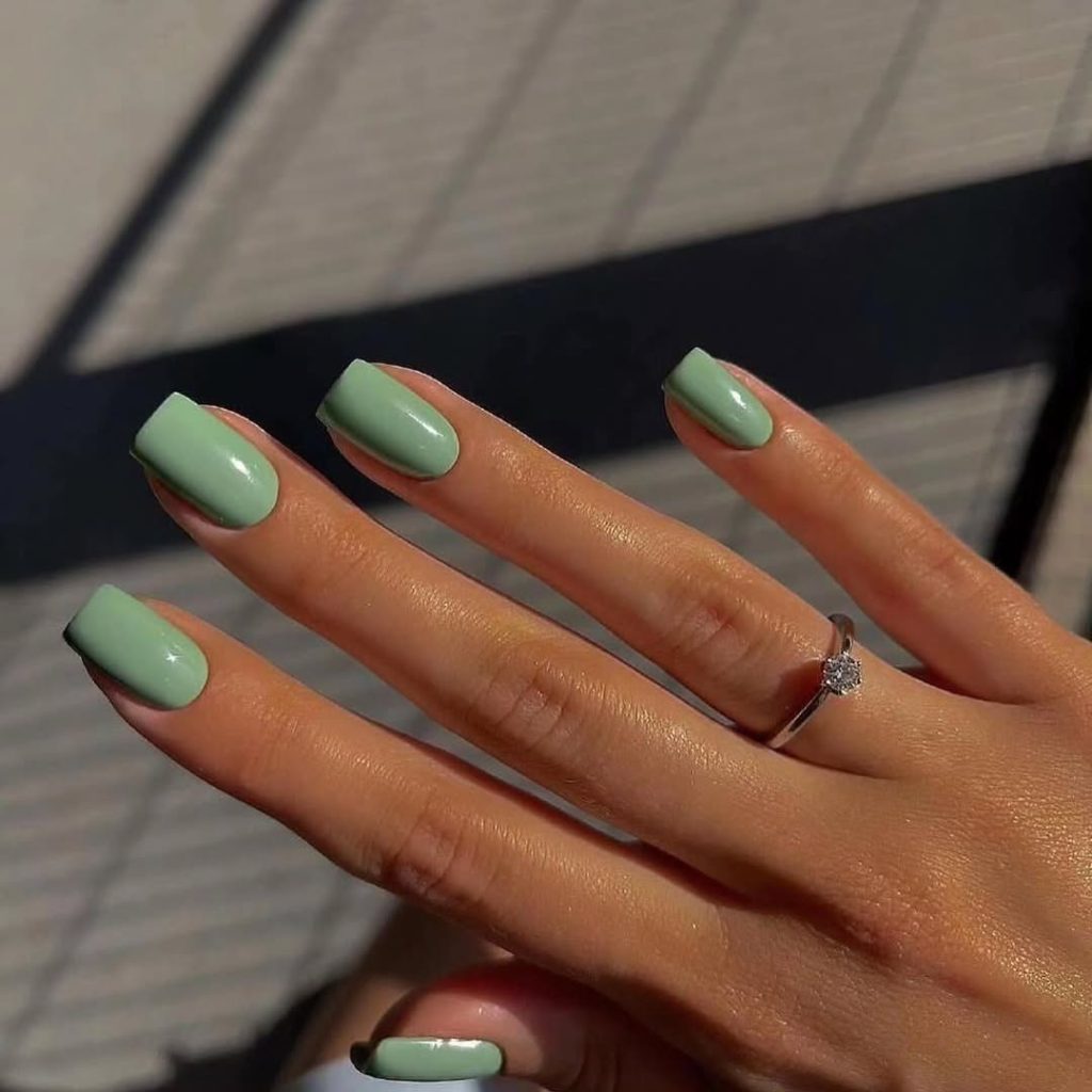 Classy spring nails with solid sage green polish
