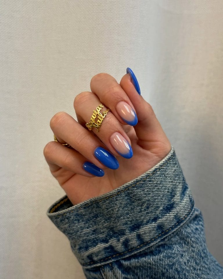 Nude and royal blue nails with blue French tips