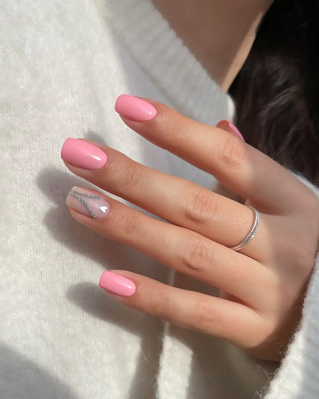 Short baby pink nails with silver geometric line accent nail