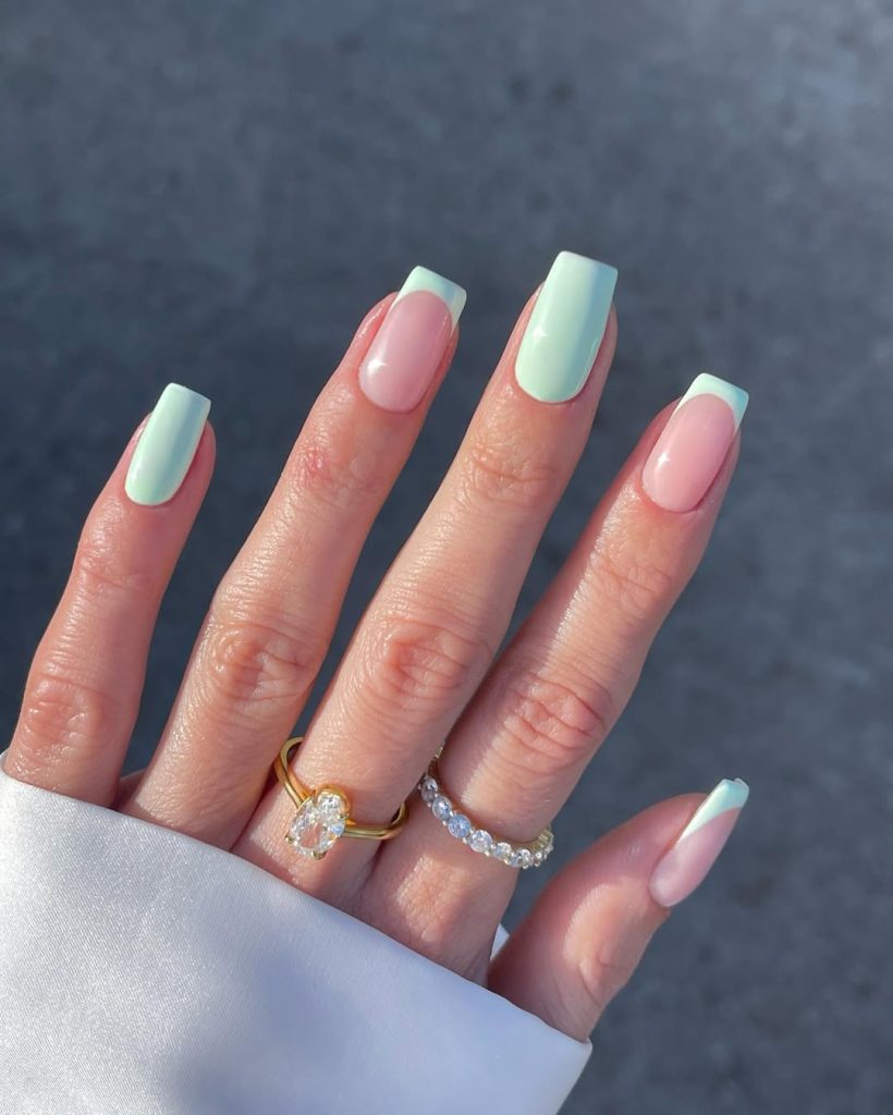 Classy spring nails alternating between pastel green and french tips
