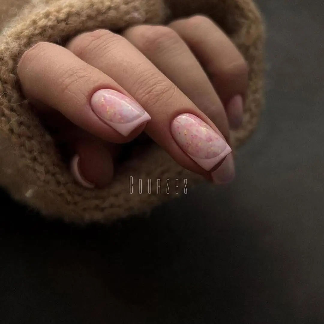 square nails with baby pink French tips and pink glitter details