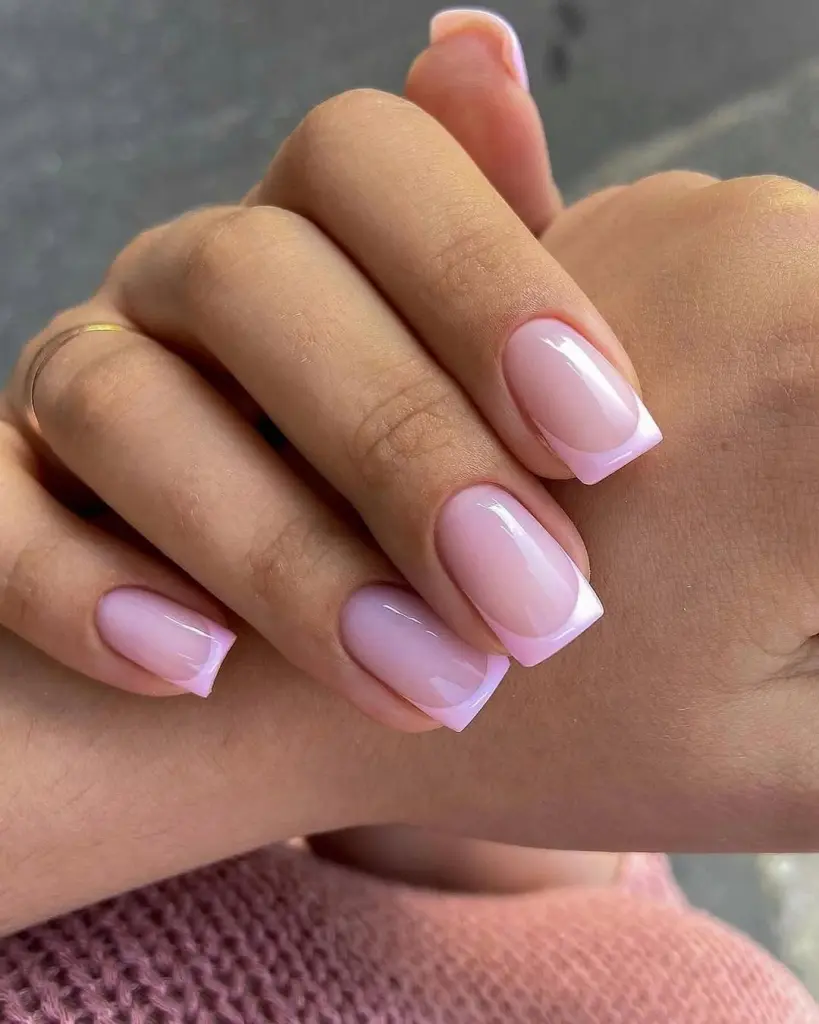 Pink French tips on a sheer base with square shape
