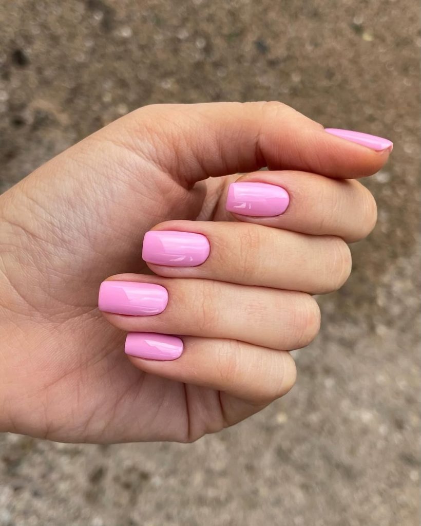 Elegant short spring nails with solid pastel pink polish