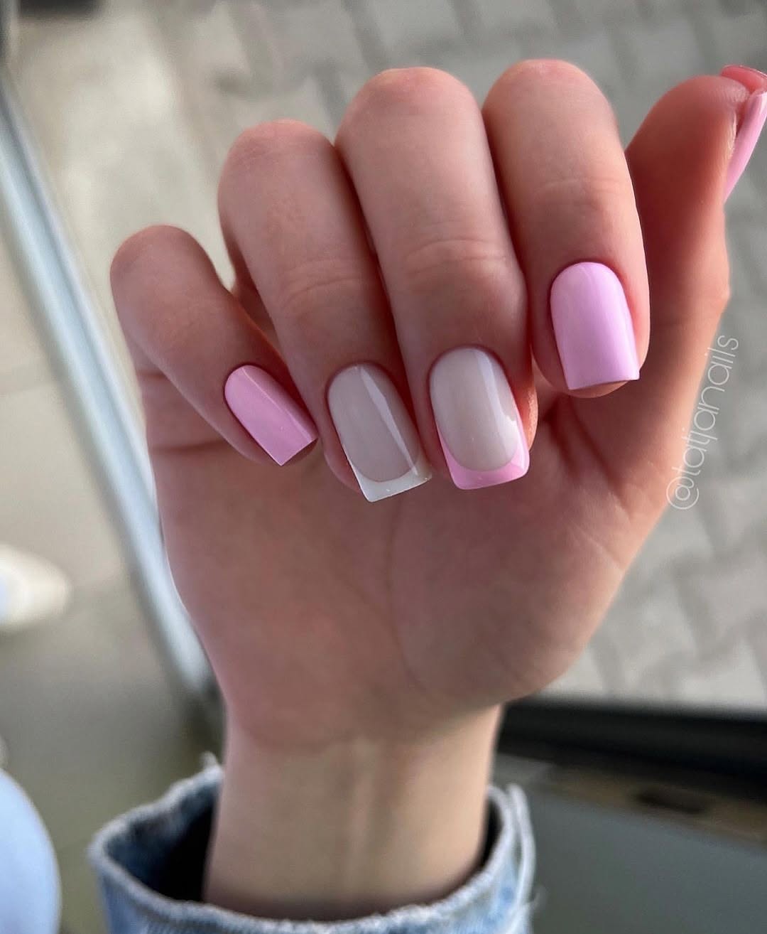 Mix of soft pink, baby pink, and white French nails on short square base
