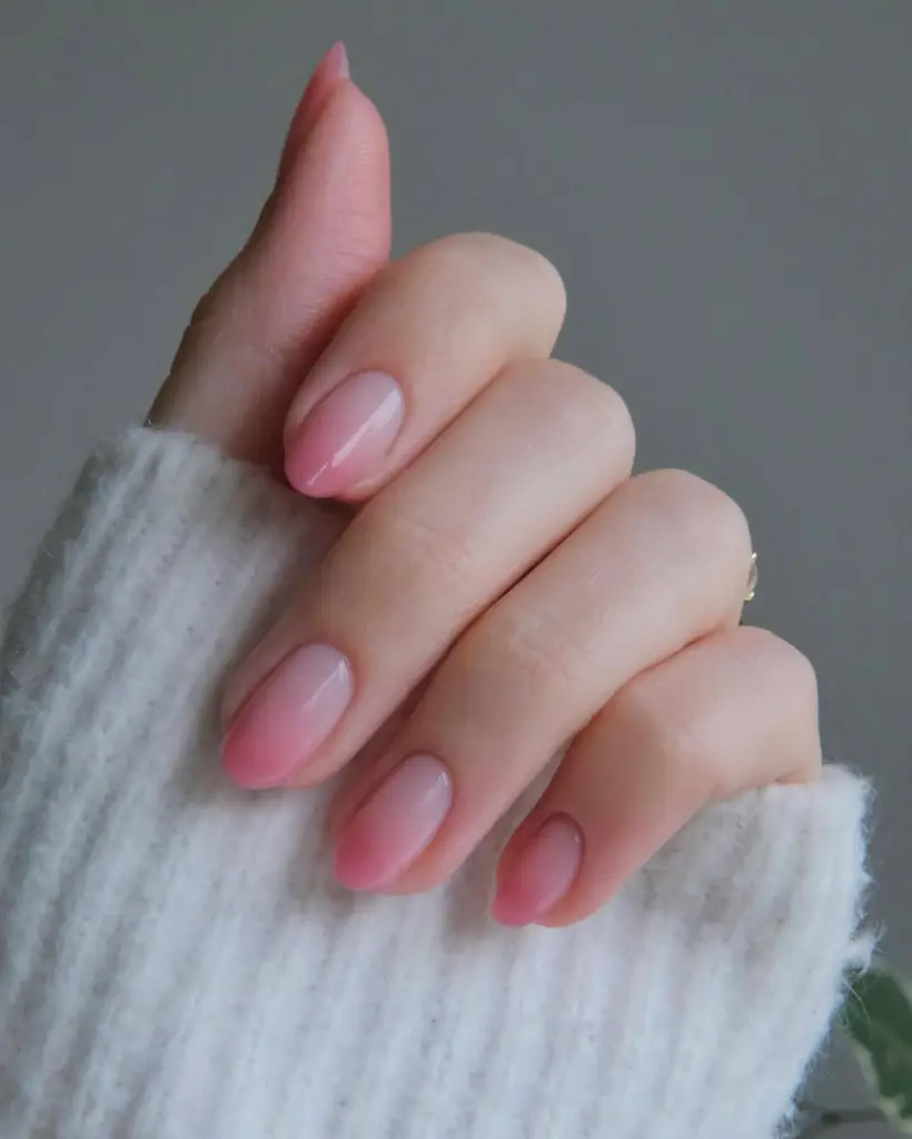  Almond nails with nude to pink ombre gradient