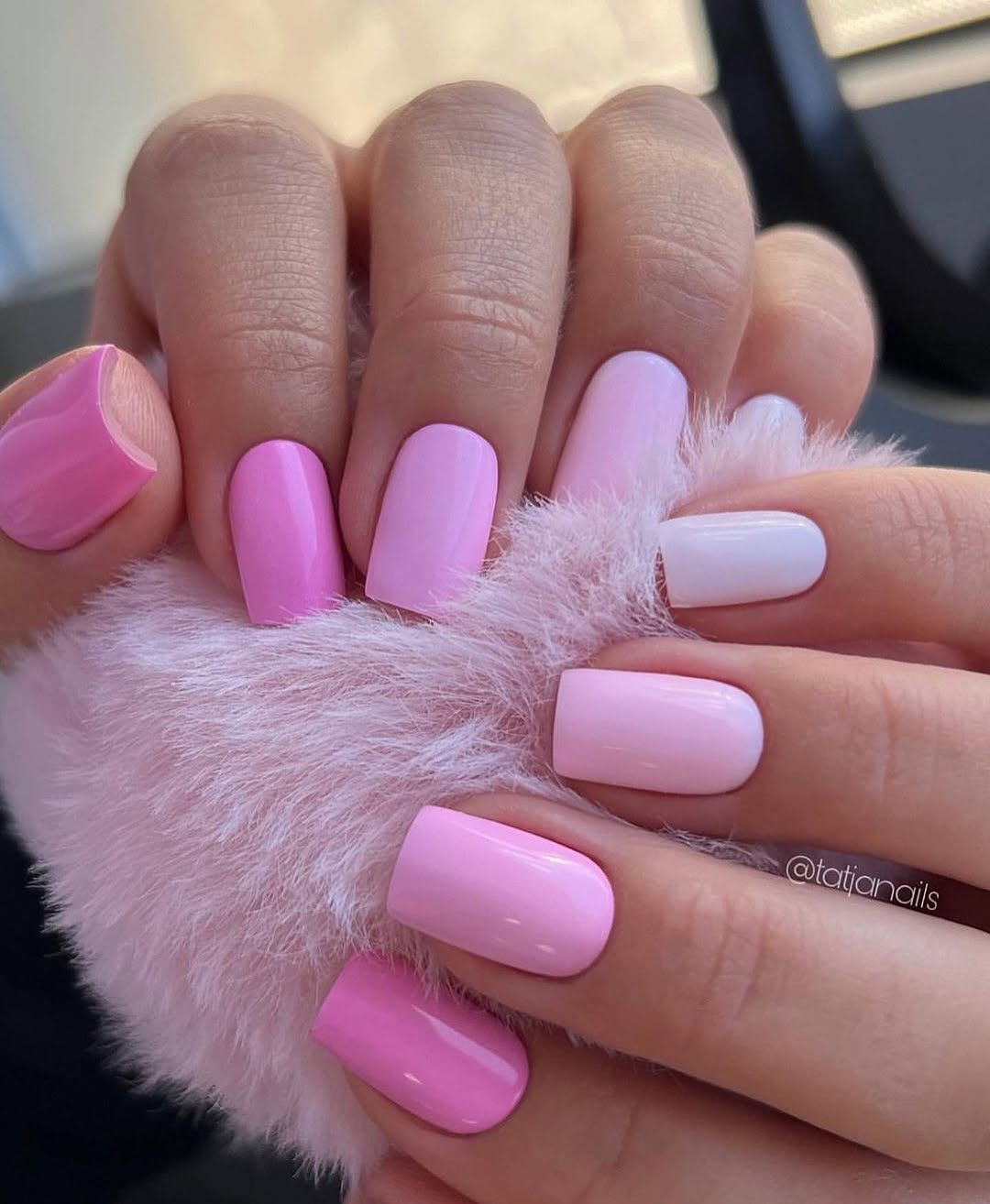 Short square nails with pink ombre skittle design from white to hot pink