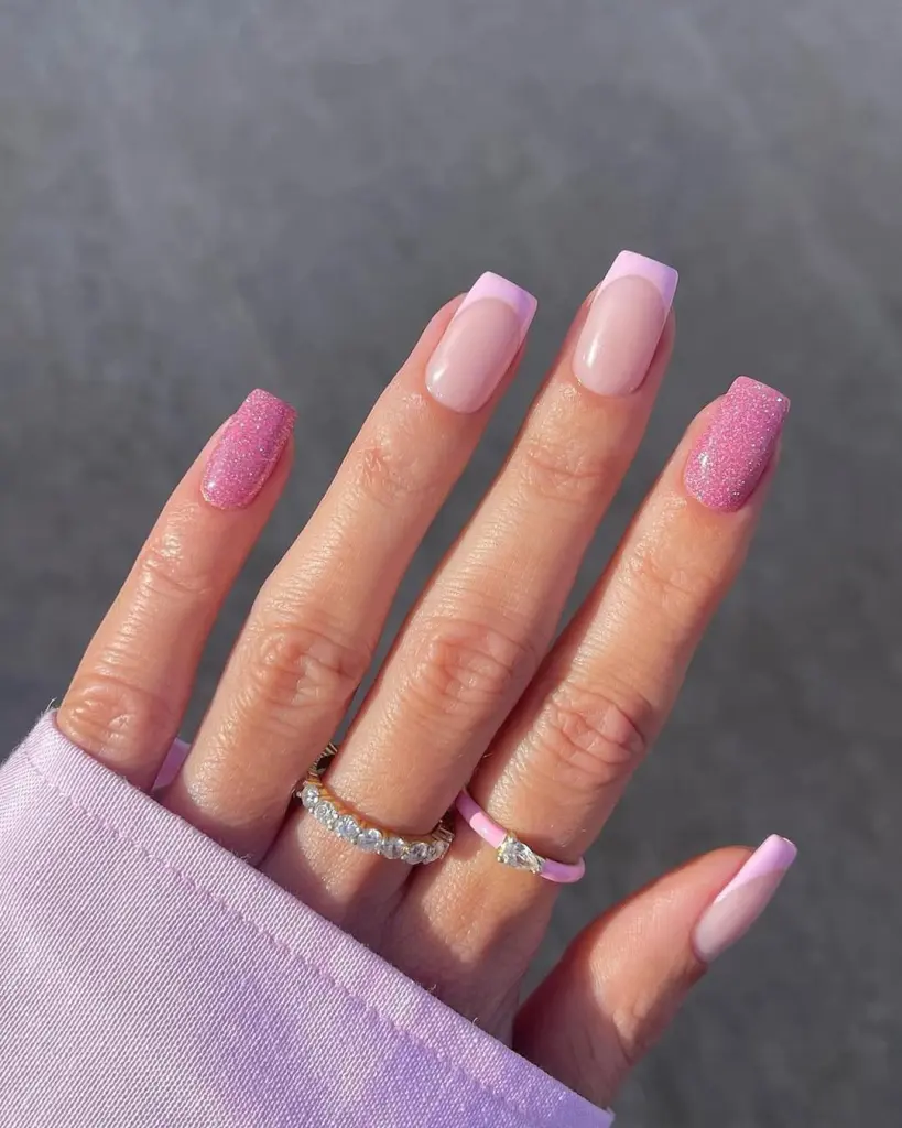 Long square nails with pink french tips and pink glitter accent nails