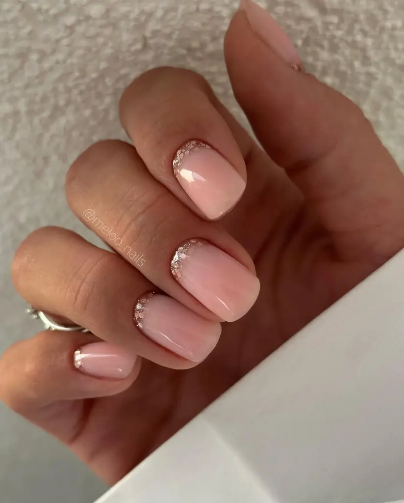 elegant short square nails with pink base and glitter cuticle outline