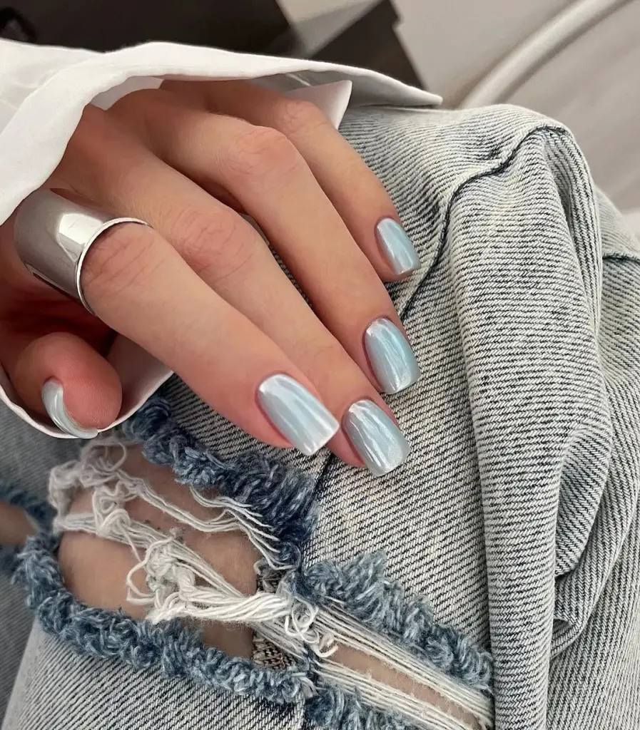 Elegant medium square nails with metallic light blue chrome finish