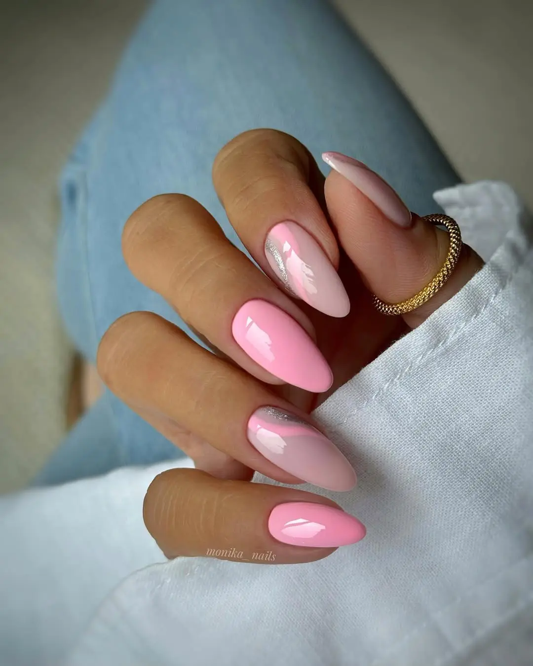Long almond nails with pink skittle gradient and silver swirls