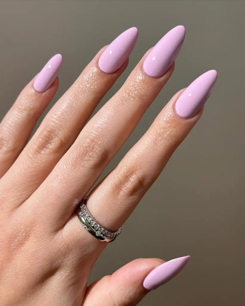 Long almond nails in glossy lavender polish