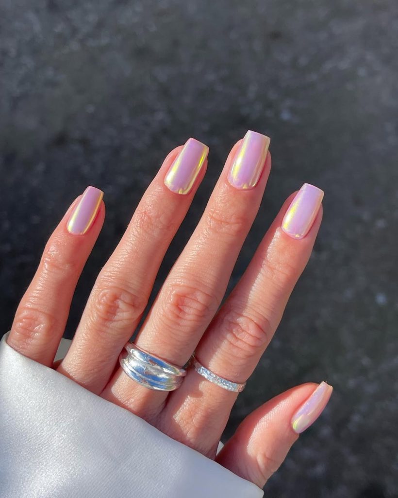 Pink chrome iridescent polish on square shaped nails