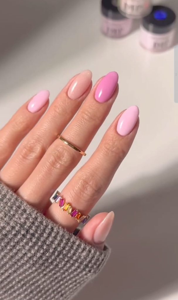 Almond nails with pink ombré dip powder design