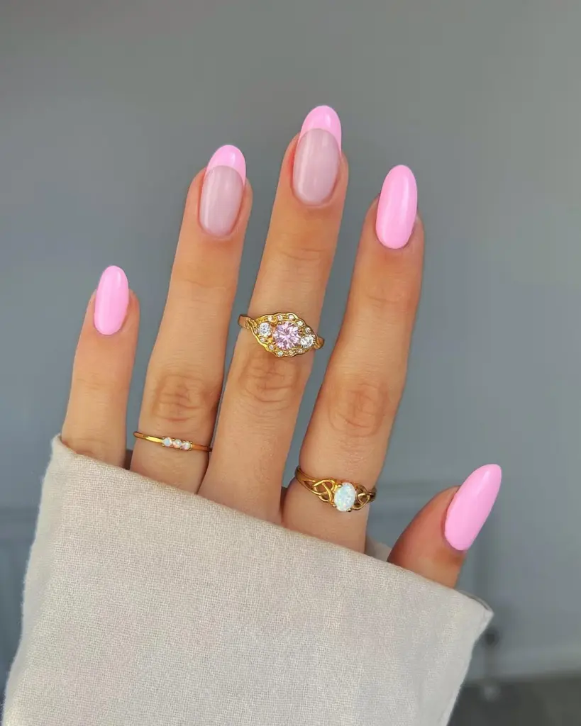 Almond nails alternating between pastel pink polish and French tips