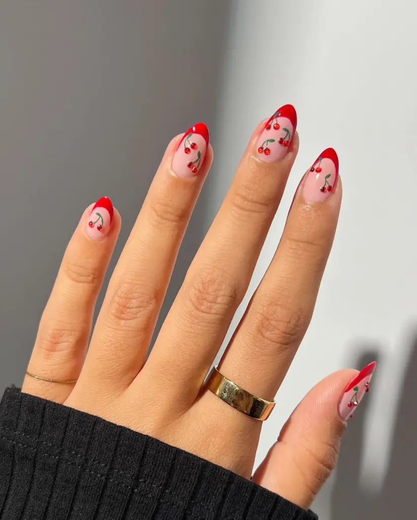 Red french tip nails with hand painted cherries