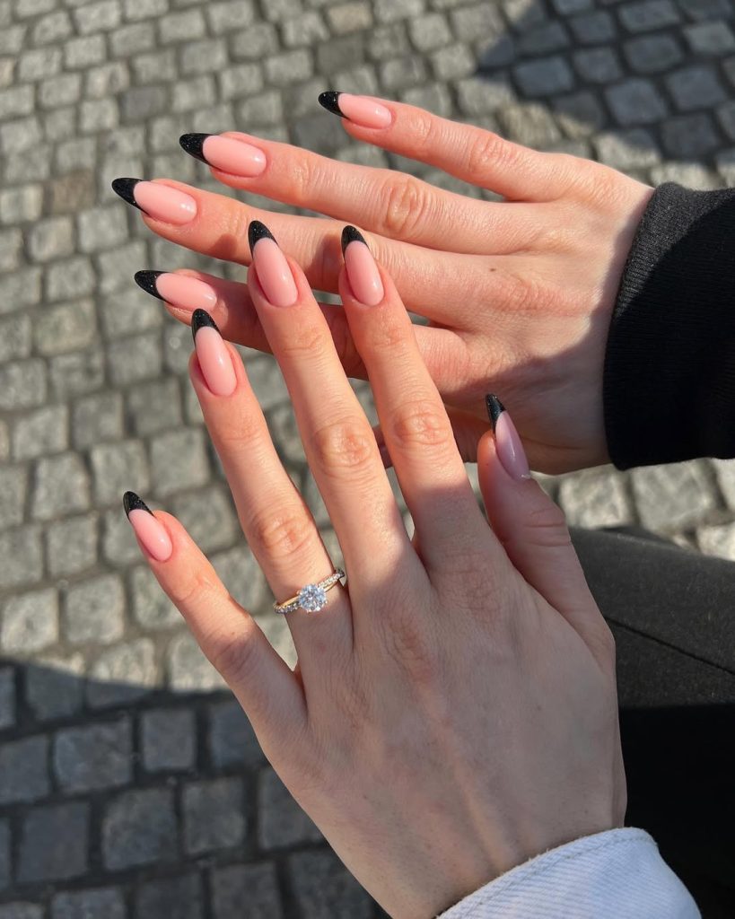 Long almond classy nails with glossy black French tips
