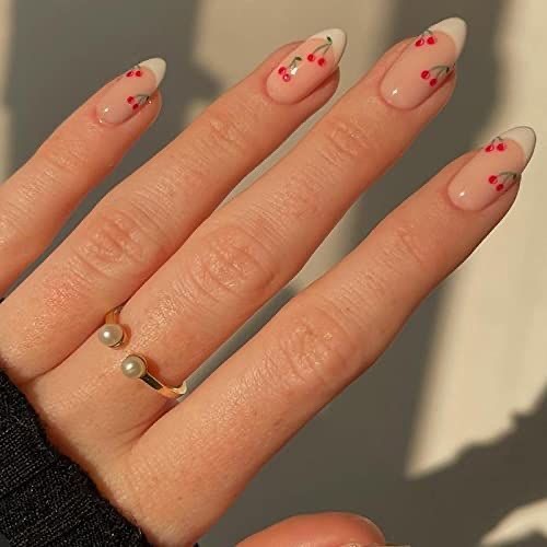 French tip nails with delicate cherry details on nude base
