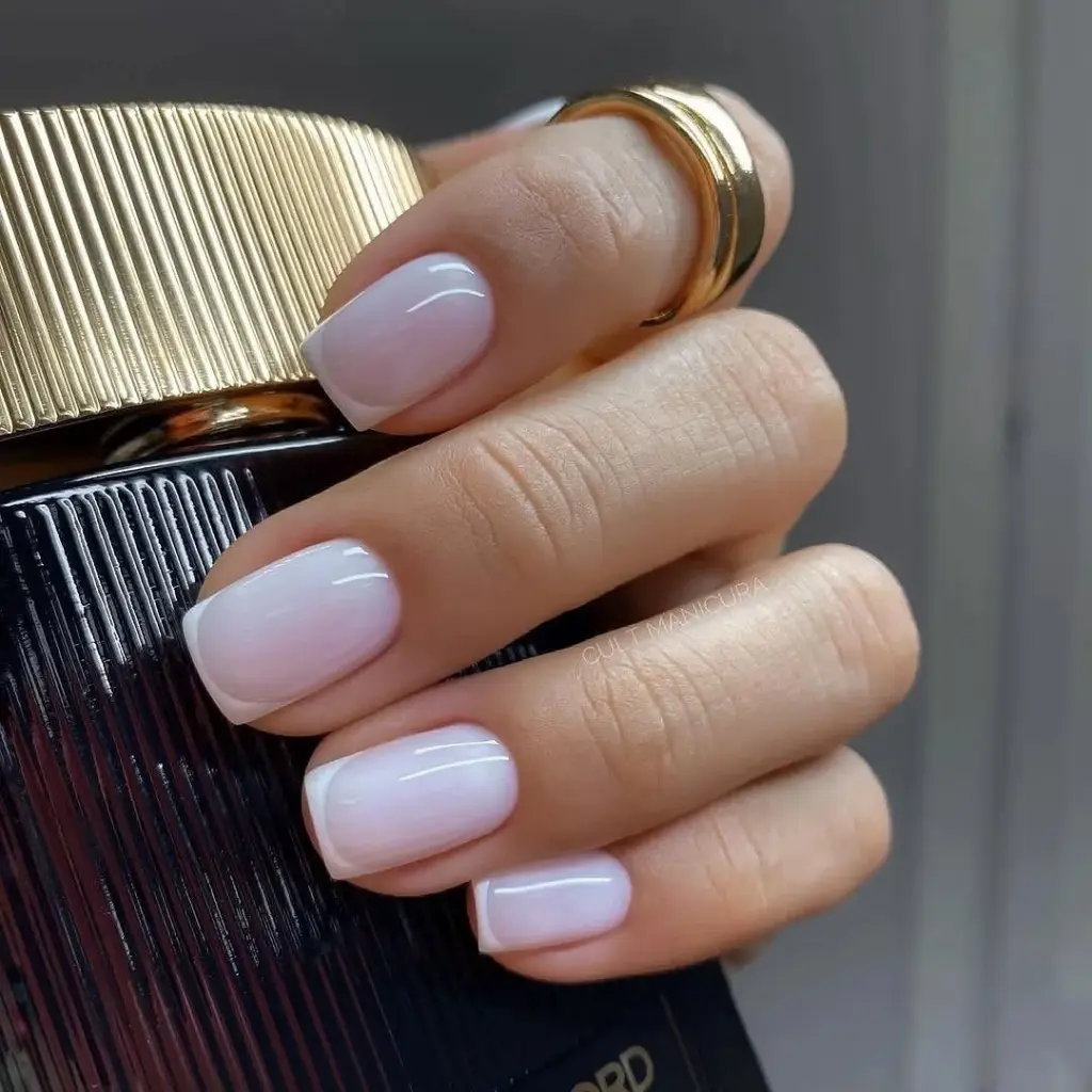 Classy and Natural French manicure with milky base and white tips