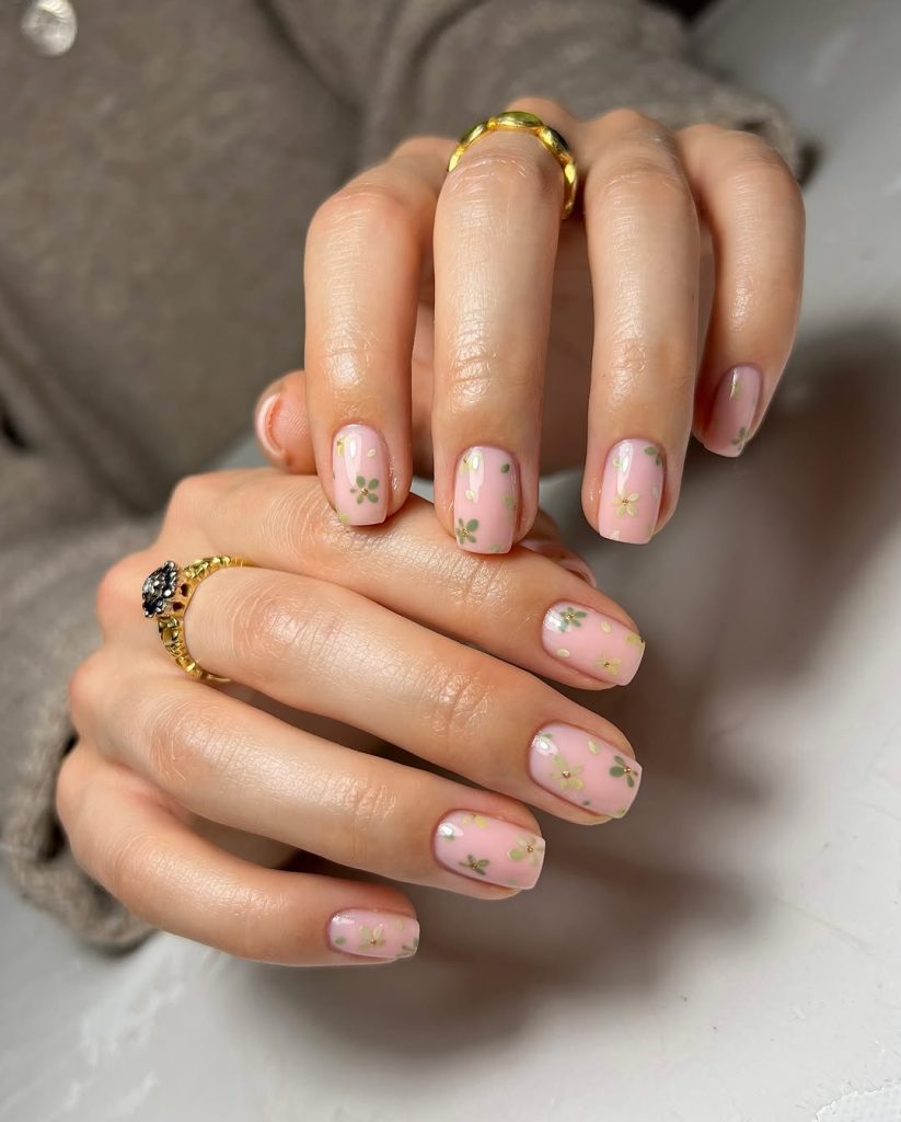 Short pink nails with green and gold micro florals
