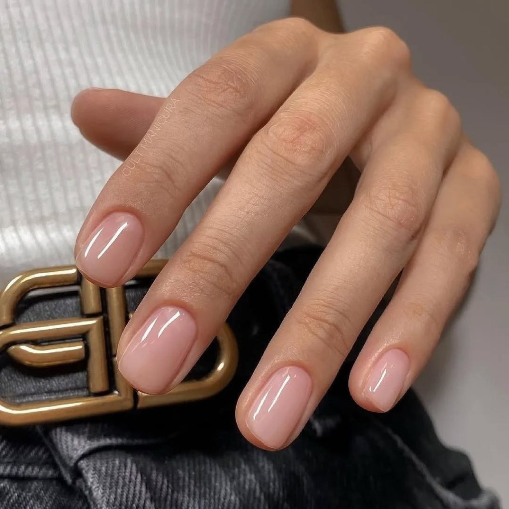 Short old money  nails with glossy nude pink polish
