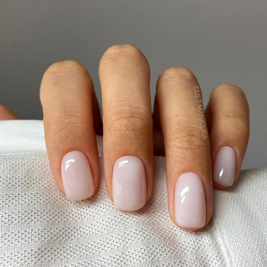 Short milky white solid color nails
