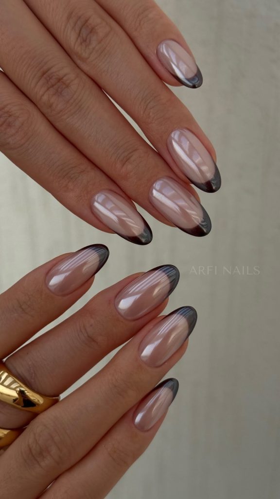 Almond french tip nails with chrome black tips
