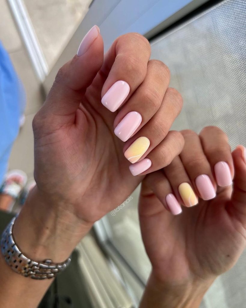 Short square nails with pink and yellow mix
