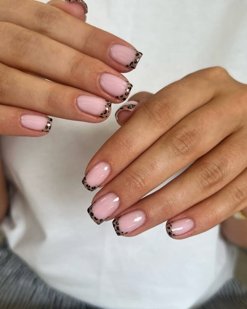 Square french tip nails with leopard print tips
