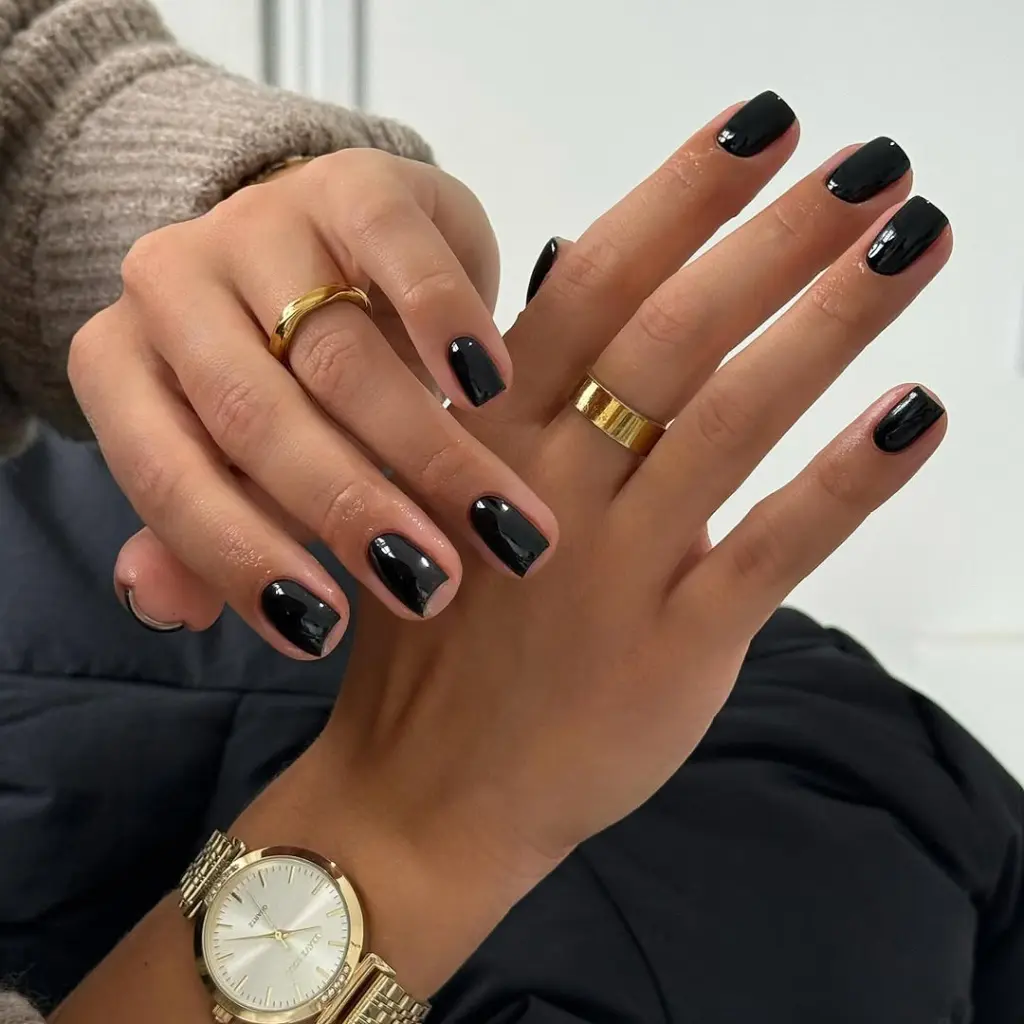 Short square classy nails with glossy black polish