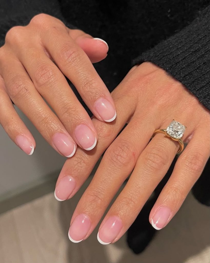Almond french tip nails with white tips
