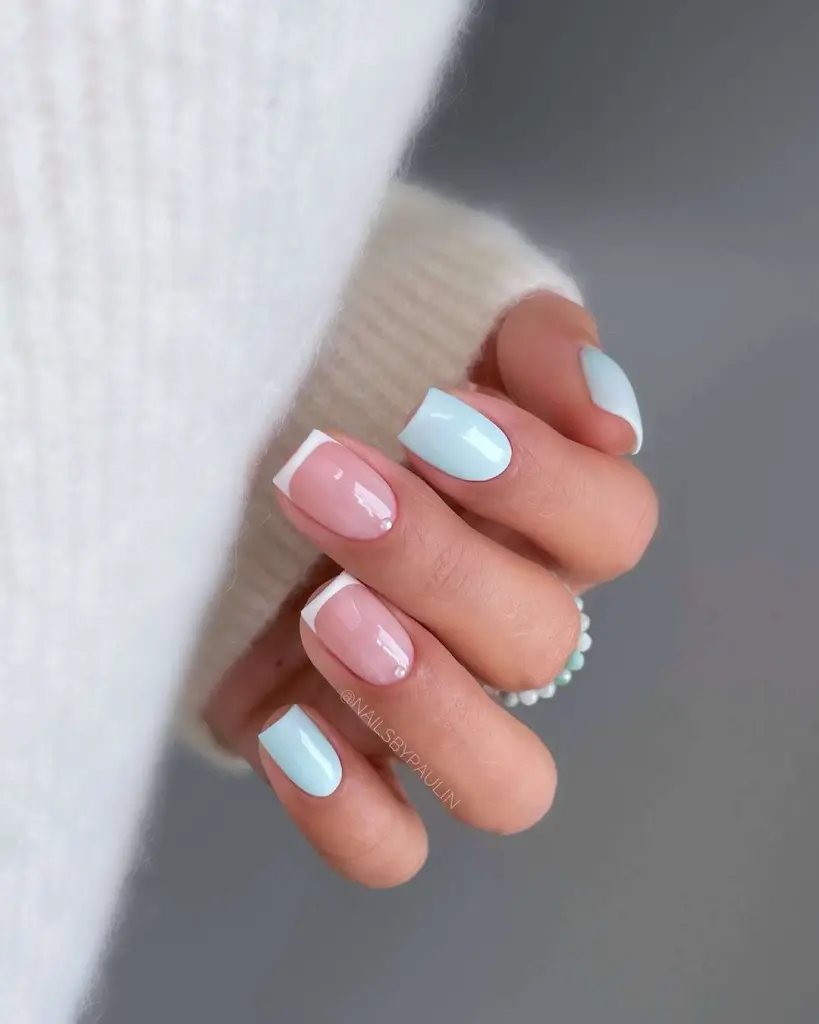 Short square nails with alternating white French tips and baby blue polish
