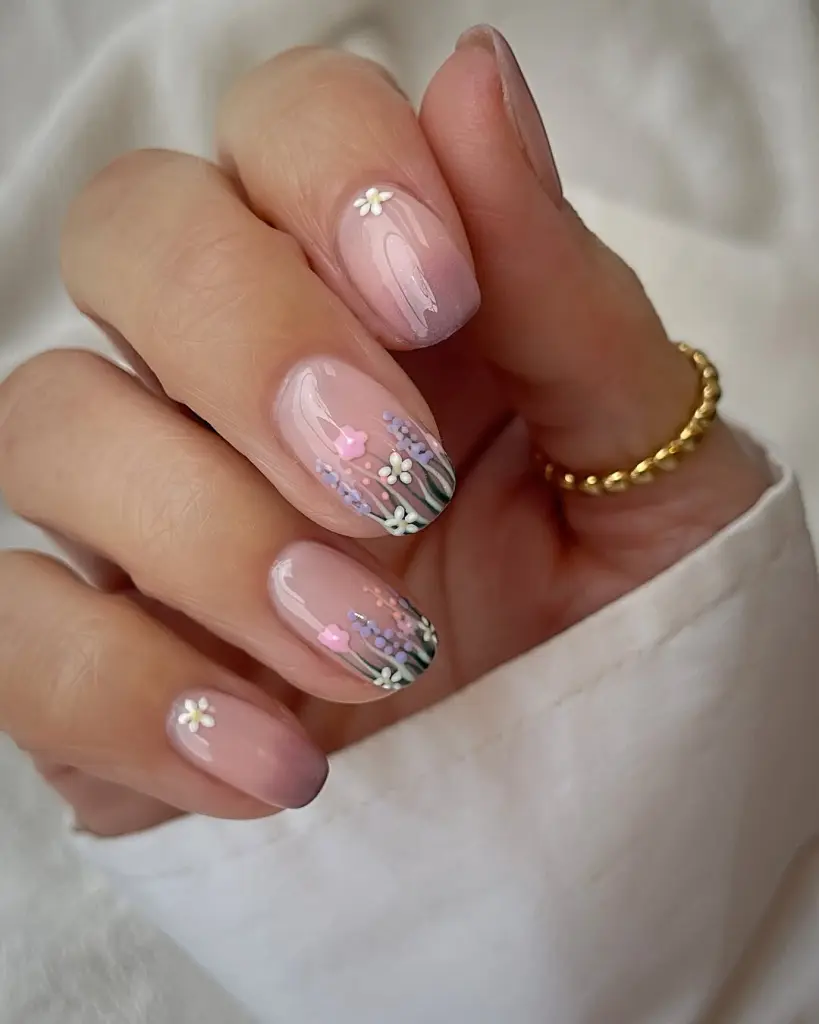 hort square pink gradient nails with detailed floral nail art including white daisies, purple lavender and pink flowers