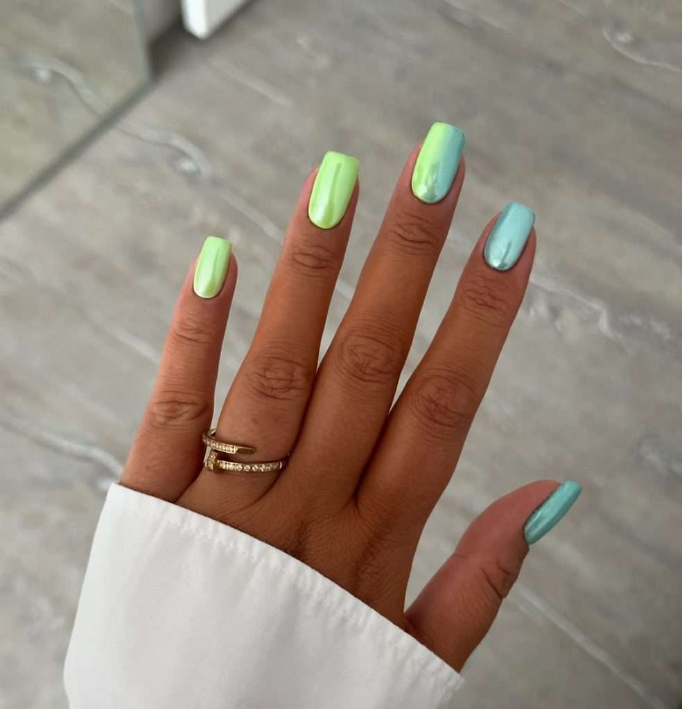 Short square nails with lime green and turquoise chrome polish in gradient effect 