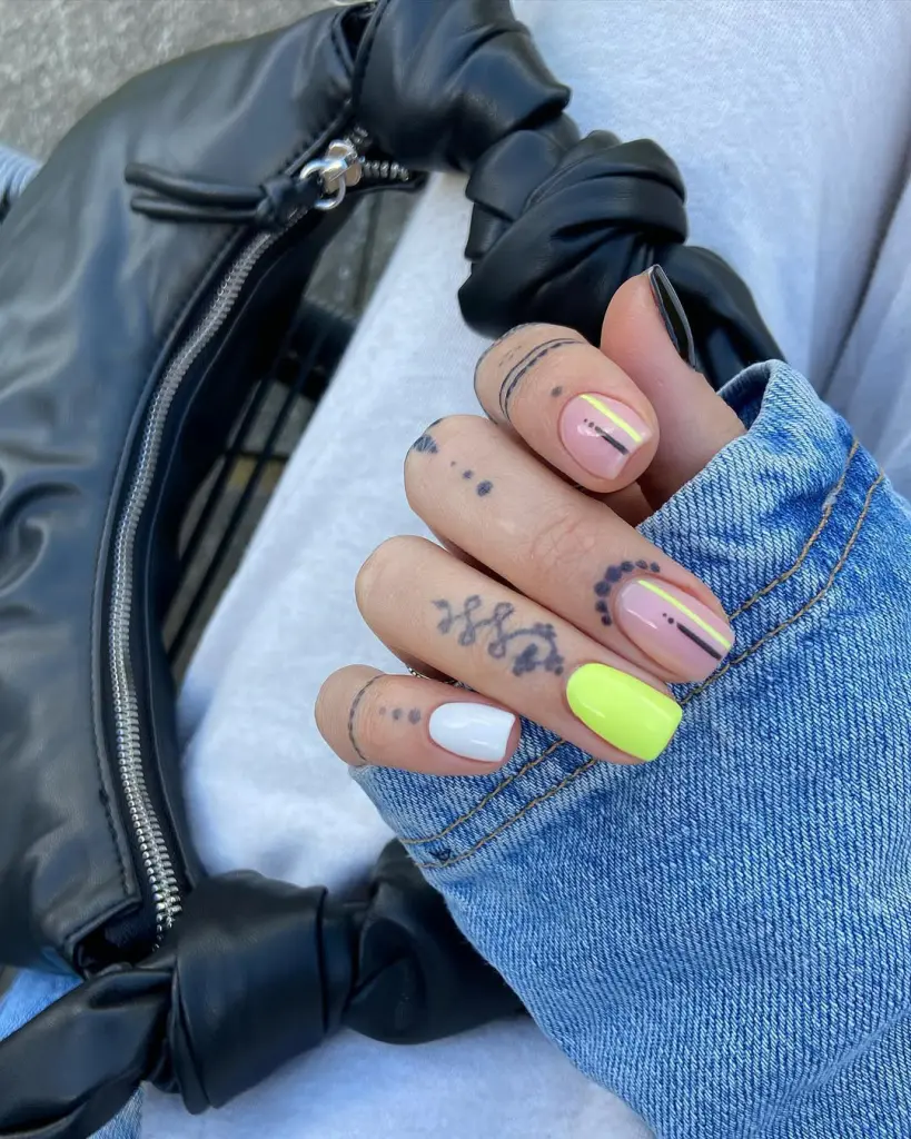 Short square summer nails with sheer pink base featuring thin neon stripes, white accent nail and neon yellow accent nail