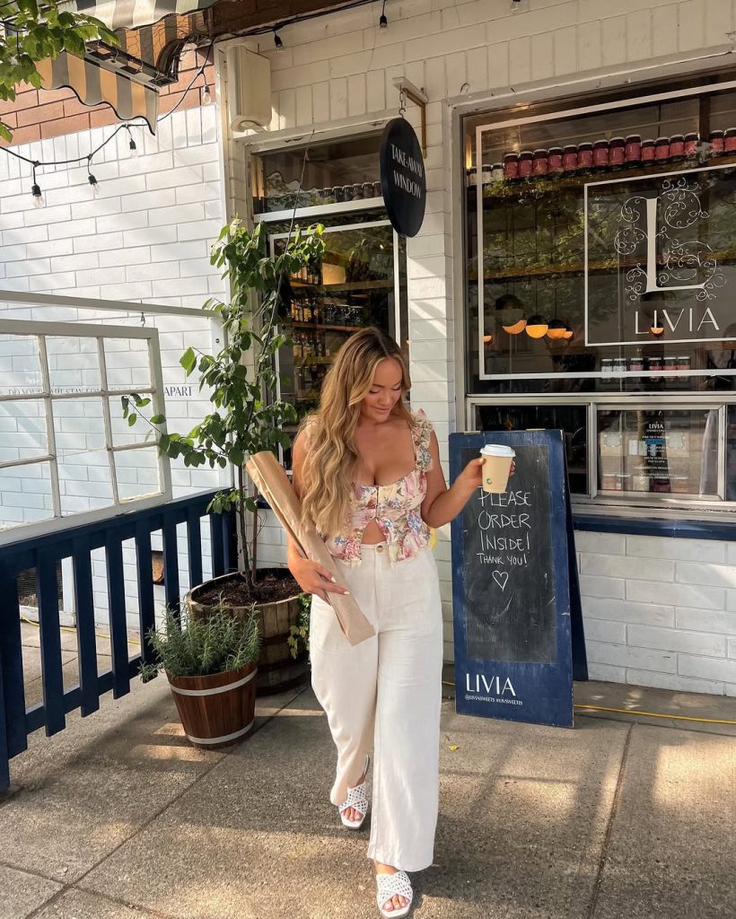 chic outfit with floral print crop top, white wide-leg linen pants, white cutout sandals