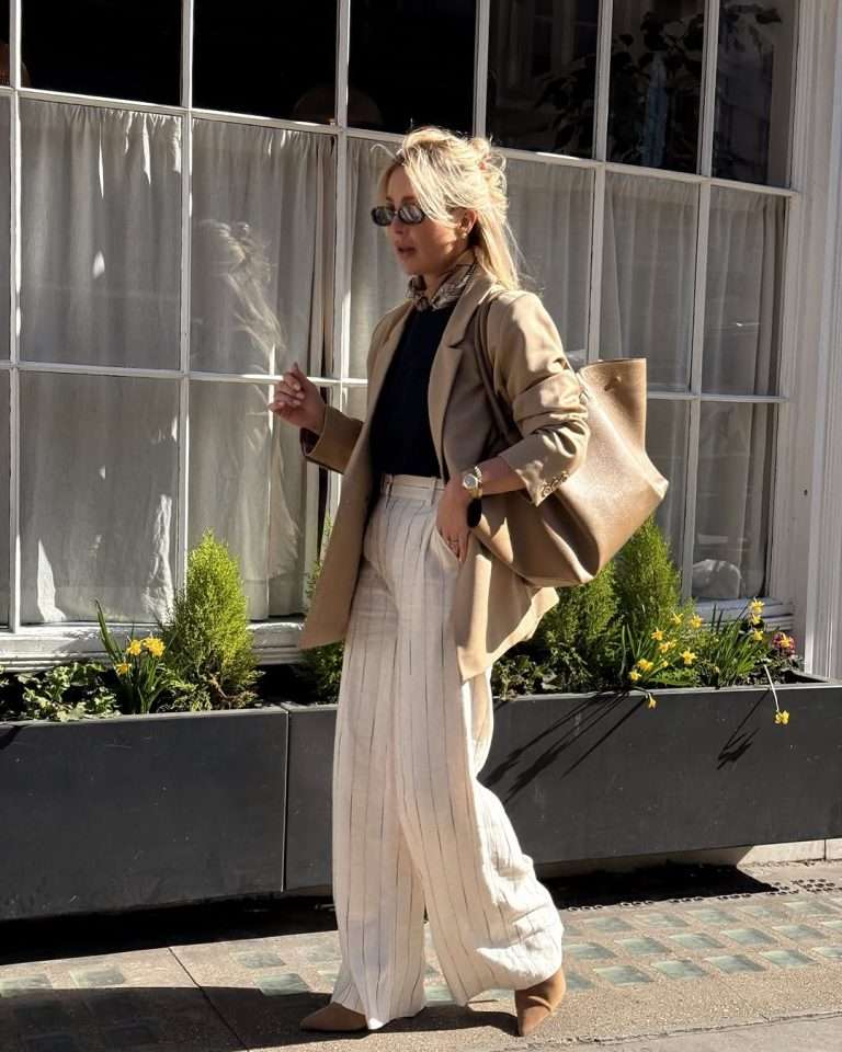 old money spring outfit with camel blazer, navy sweater, white pinstripe trousers, printed silk scarf and tan leather tote