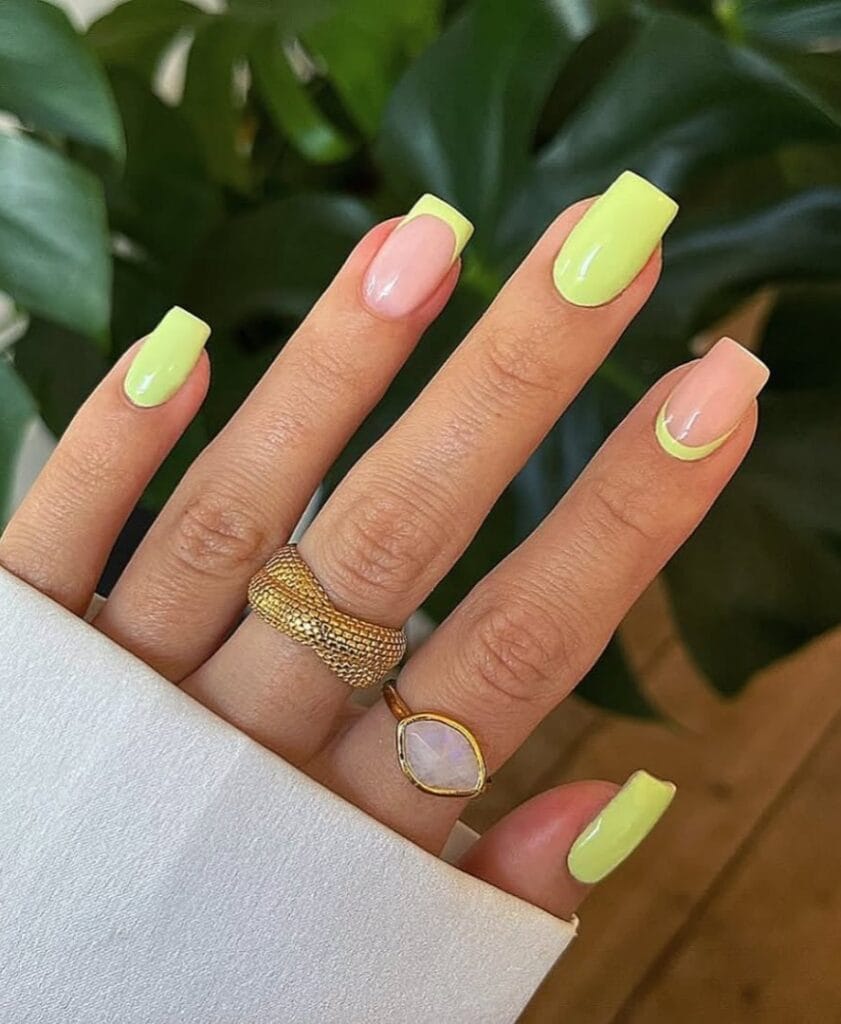 Square minimalist nails alternating between full neon lime green and nude with lime green French tips