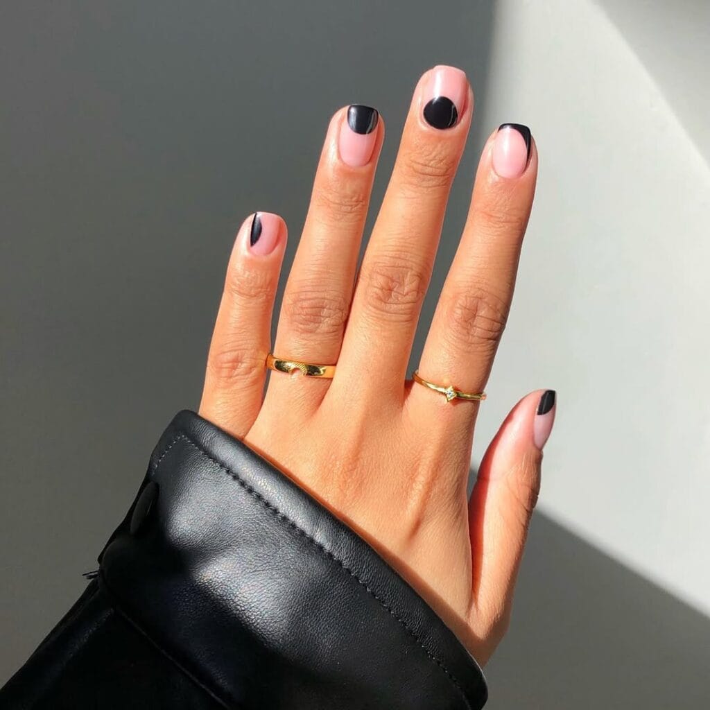 Short square minimalist nails with pink base and glossy black abstract half dip accent on each nail