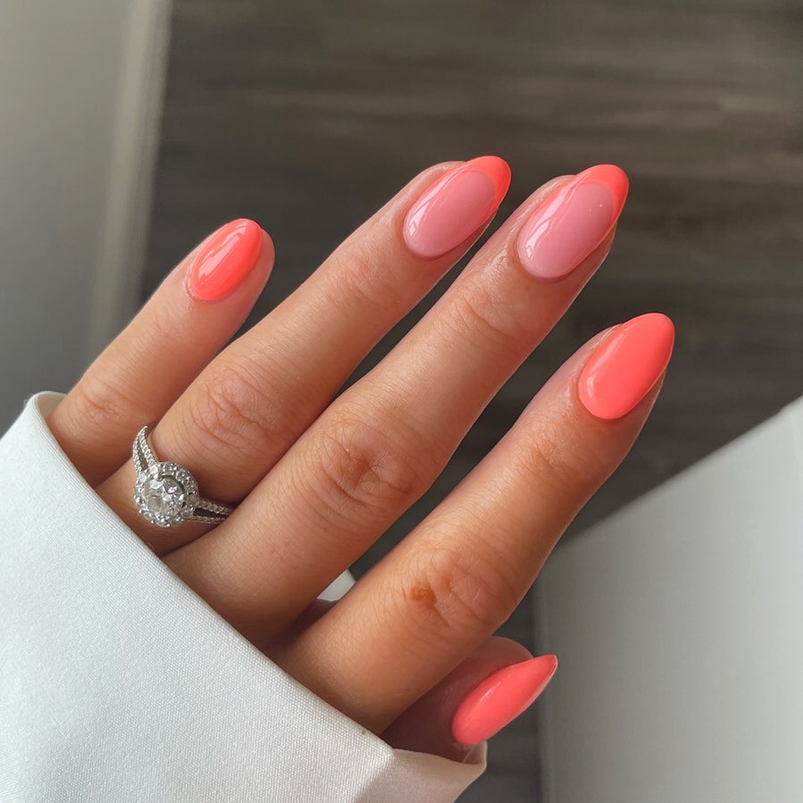 Classy summer nails with almond shape in coral pink shades with French tips and solid colors