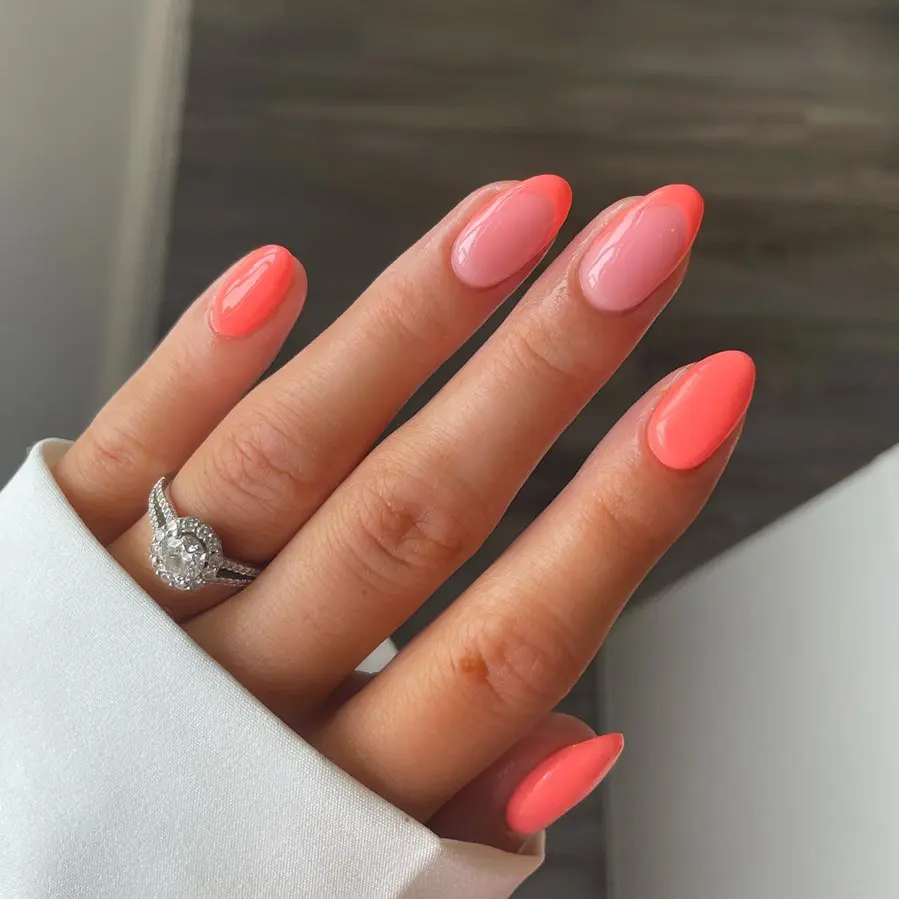 Classy summer nails with almond shape in coral pink shades with French tips and solid colors 