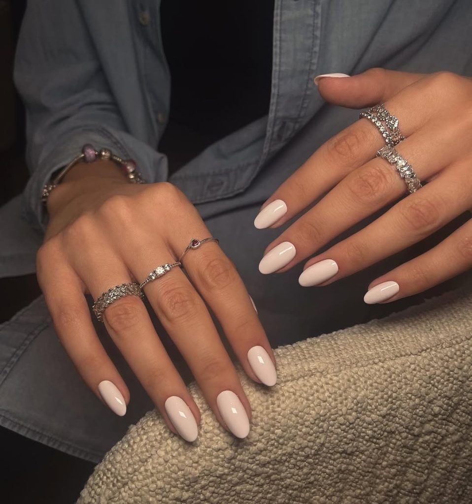 old money almond nails with glossy ivory white polish
